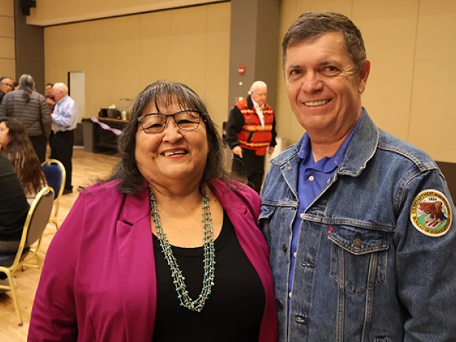 Joan poses with NNI's incoming Director Dave Beeksma at her retirement celebration