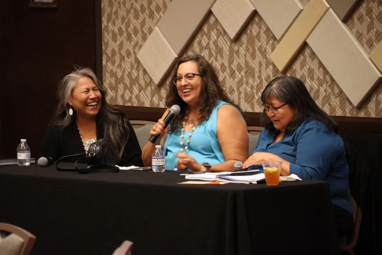 Standing Rock Sioux Chairwoman Janet Alkire, Tohono O'odham Legislative Chairwoman Wavalene Saunders and NNI Executive Director Joan Timeche (Hopi) share a laugh during a panel discussion.