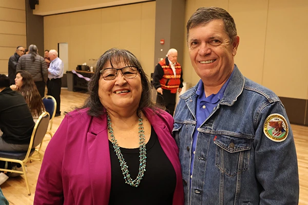 Joan poses with NNI's incoming Director Dave Beeksma at her retirement celebration